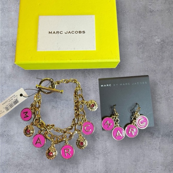 Marc Jacobs Jewelry - Marc Jacobs Gold Bracelet with Pink Charms